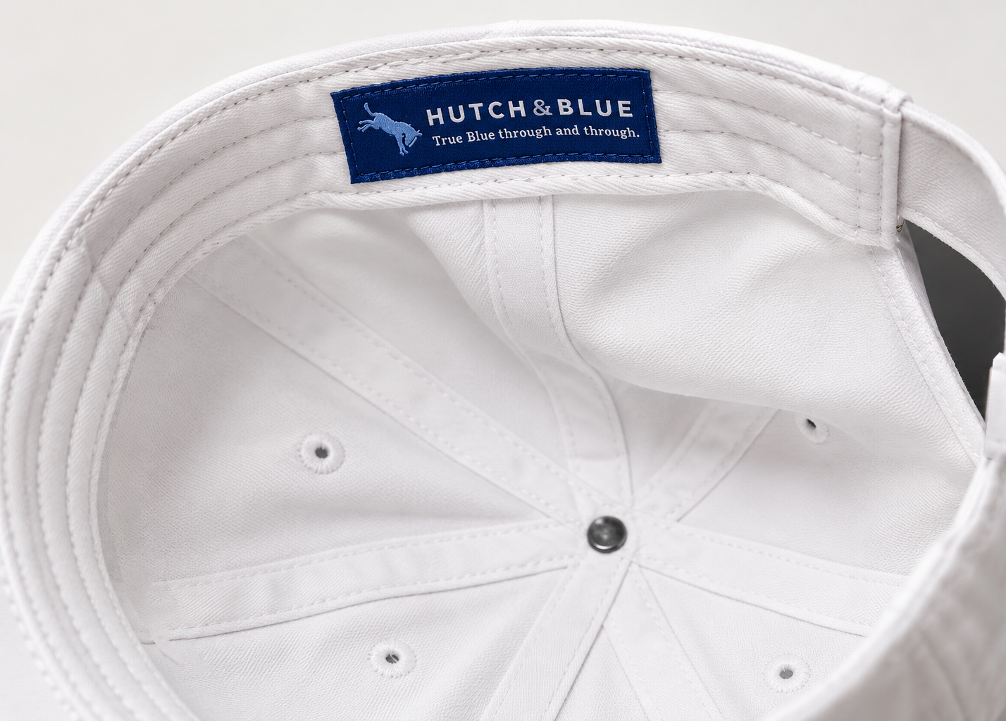 Hutch & Blue Dad Hat adjustable back strap and branded hardware detail